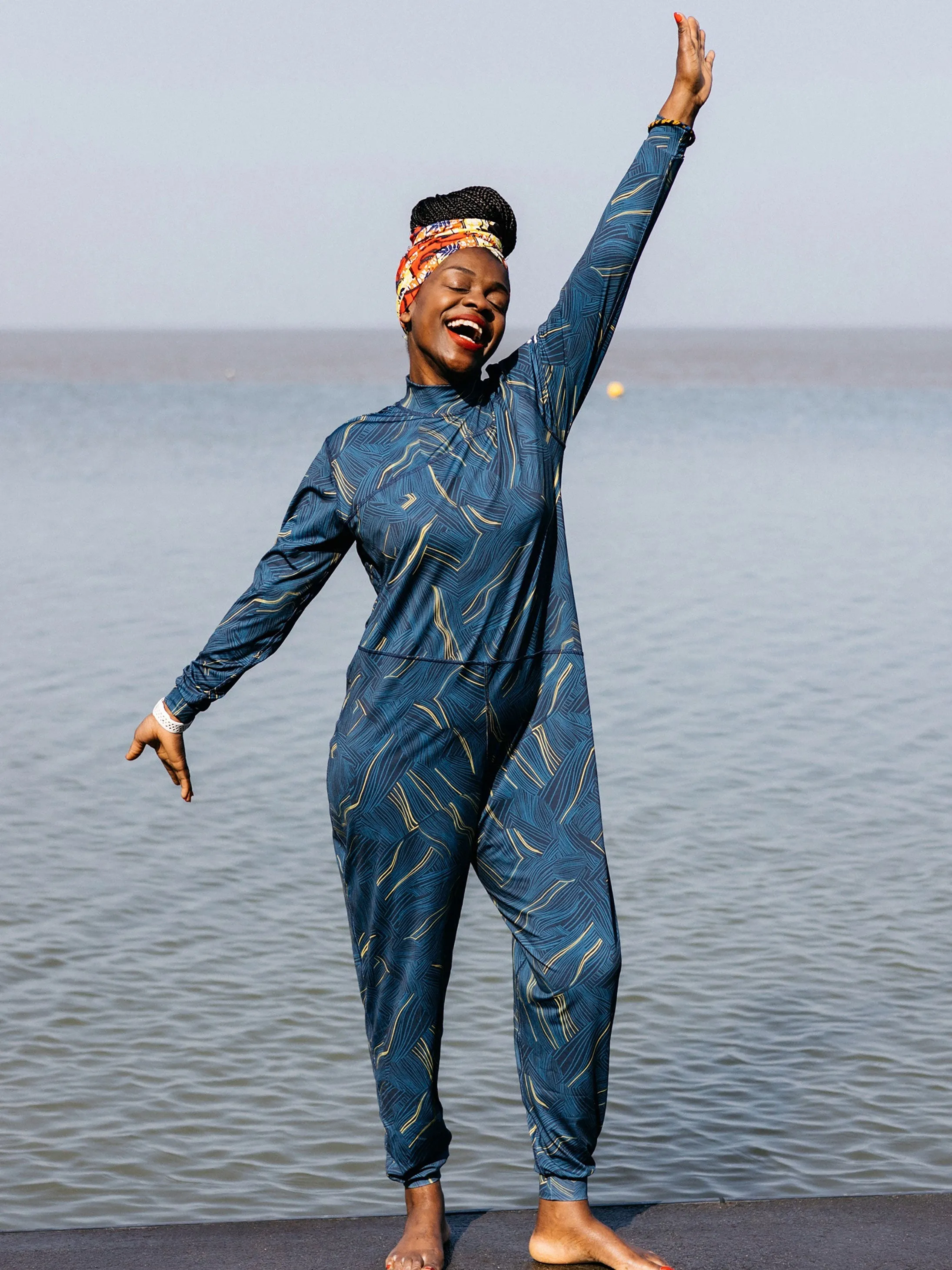 Vibrant Patterns Seaside Escape Into The Sea' Seasuit